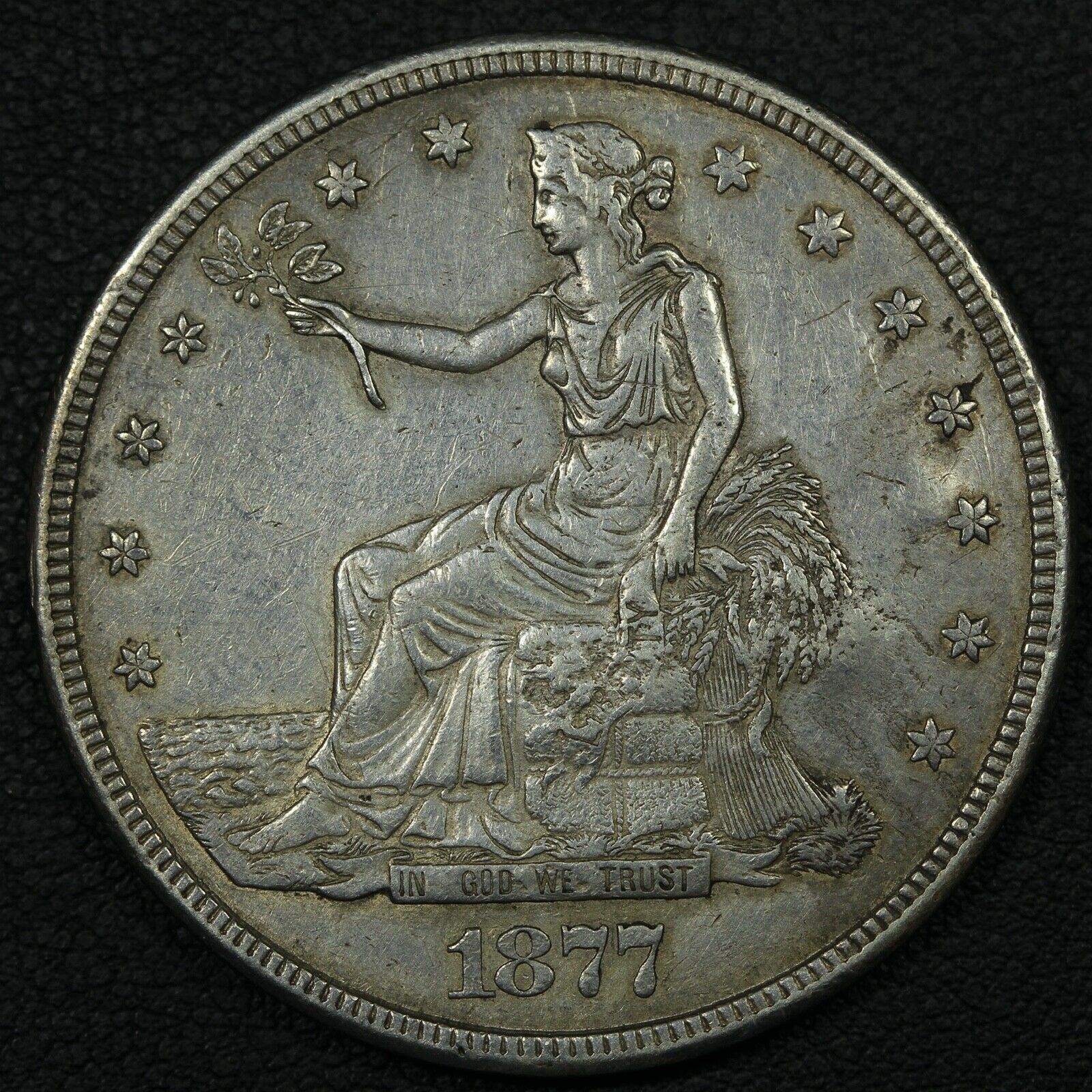 1877 S Chopmarked Trade Silver Dollar - Cleaned