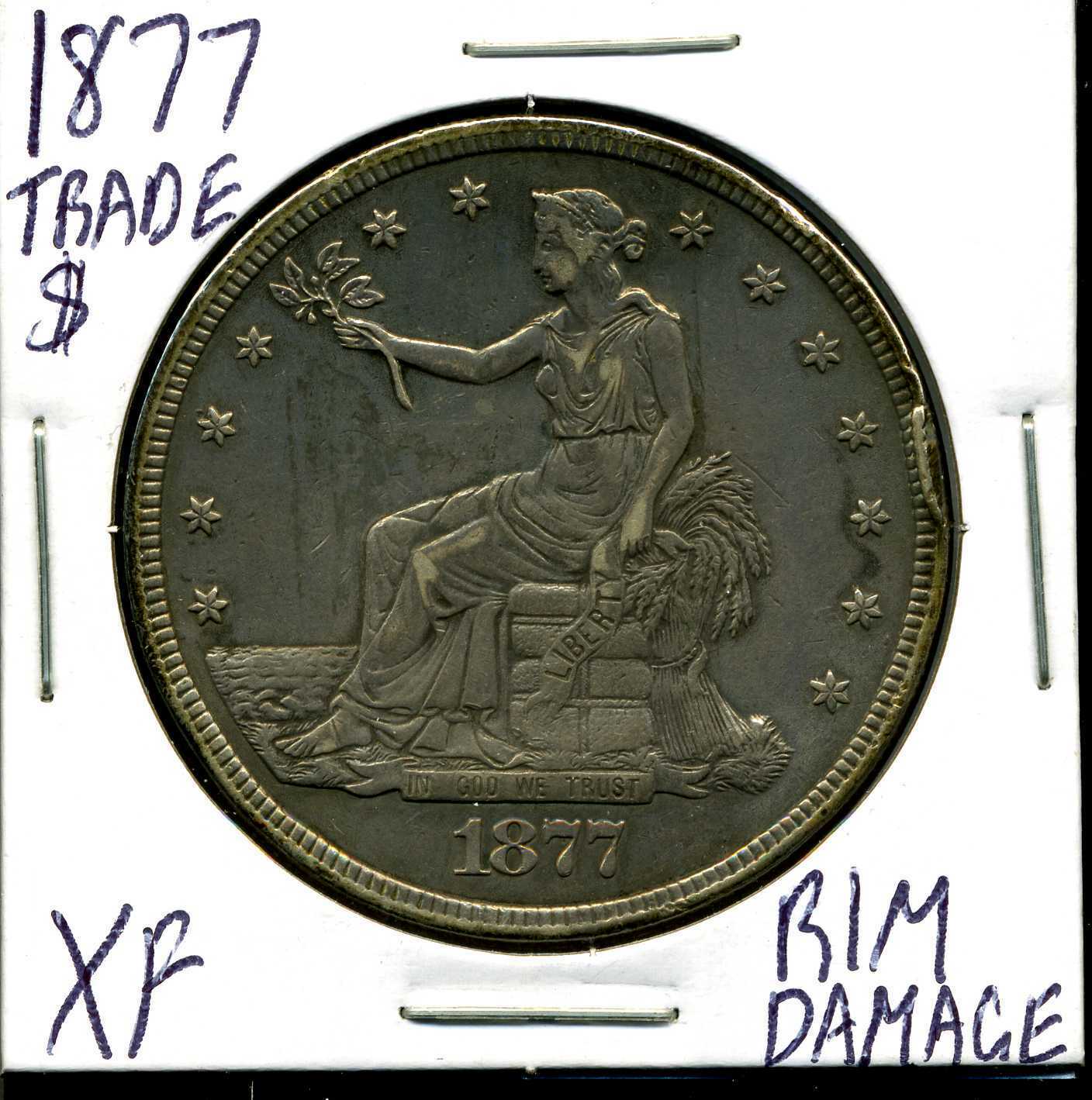 1877 $1 Trade Silver Dollar with XF Detail Rim Damage #05197